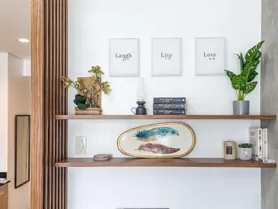 a shelf with cards and a plate on it at Studio Condo Manila by the Bay Roxas Blvd near US Embassy in Manila