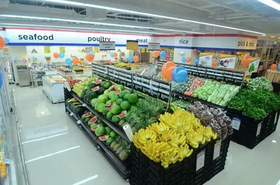 a produce section of a grocery store with fruits and vegetables at Makati Condo Edsa MRT Magallanes Station Chino Roces Ave cor EDSA IT Hub ONE Ayala Alphaland WiFi by 24K Residences in Manila