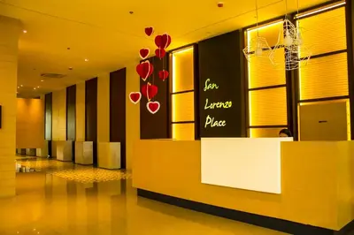 a lobby with a store with red hearts on the wall at Makati Condo Edsa MRT Magallanes Station Chino Roces Ave cor EDSA IT Hub ONE Ayala Alphaland WiFi by 24K Residences in Manila