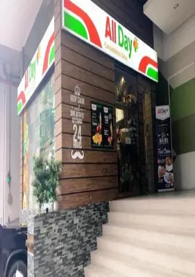 an all day fast food restaurant with stairs in a building at EV Place in Manila