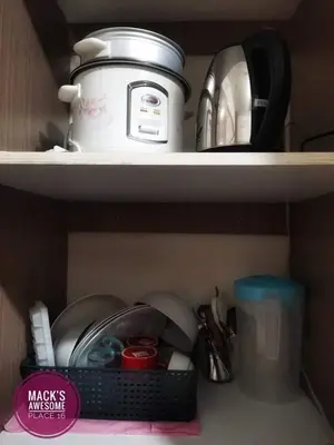 a shelf with a pot and a blender on it at Macks Awesome Place 05 with Netflix and FastUnliwifi in Manila