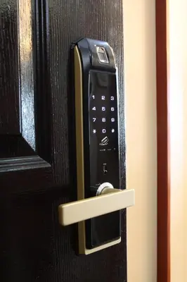 a black door handle with a phone on it at Malate Bayview Mansion city view in Manila