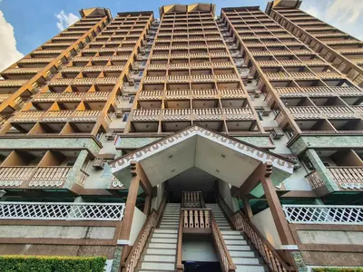 a tall building with stairs in front of it at SweetSuites at Pine Crest #T3-239 in Manila