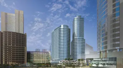a rendering of two tall buildings in a city at Seda Residences Makati in Manila