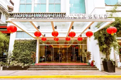 a hotel lobby with red lanterns in front of a building at Hotel Lucky Chinatown Binondo Manila in Manila