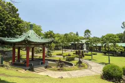 a gazebo in a park with a fountain at OYO 152 Sangco Condotel in Manila