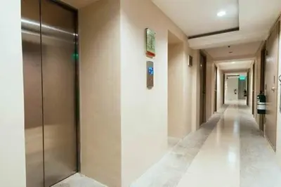 a hallway of a building with a walk way at Urban Deca Tower OYO 3 in Manila