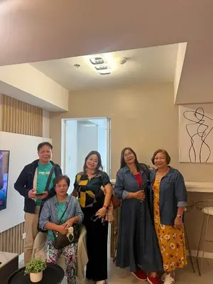 a group of people standing in a room at AZURE URBAN RESORT RESIDENCE R&C - Parañaque in Manila