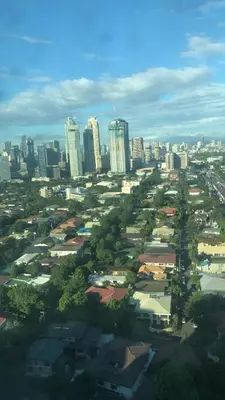 an aerial view of a city with tall buildings at SAN LORENZO PLACE 2BR 29-E by LARICO in Manila
