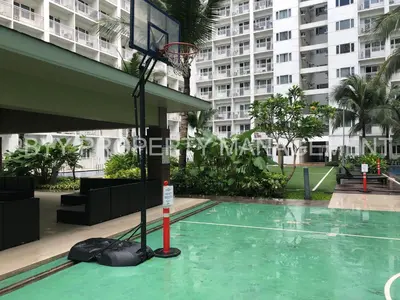 a basketball hoop in the middle of a building at Shore Residences, Mall Of Asia Complex Stayction by PBYY in Manila
