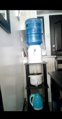 a food processor on a shelf in a kitchen at Estien’s Cozy Condotel to Stay in Imus