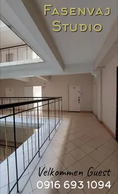 a view of the hallway of a building with a pool at NAIA Airport Fasanvej Studio condo NetflixTv 4pax in Manila