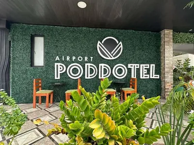 an airport podologist sign on the side of a building at Airport Poddotel Inc. in Manila