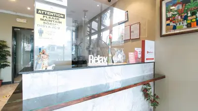 a store front with a counter in a building at RedDoorz Plus at MM Hotel Las Pinas former RedDoorz Plus Near Bamboo Organ in Manila