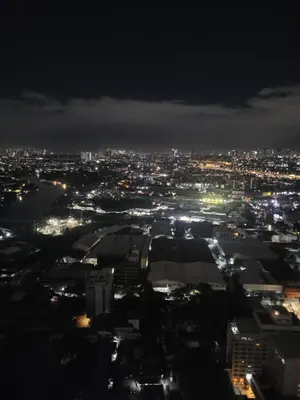 a view of a city at night at Juja's place in Manila