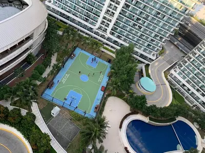 an overhead view of a basketball court in a city with buildings at Azure C2 Balcony wifi Near Mall Airport MULTIPLE UNITS in Manila