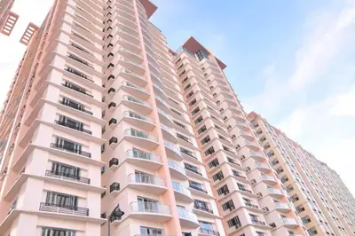 a tall apartment building with balconies on the side of it at Modern Stylish Condo in Morgan Suites McKinley with Wi-Fi in Manila