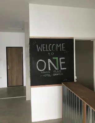 a welcome to one sign on a wall in a building at One Biñan Place in Biñan