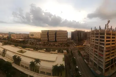 an aerial view of a city with tall buildings at A SPECIAL PLACE Shore Residences in Manila