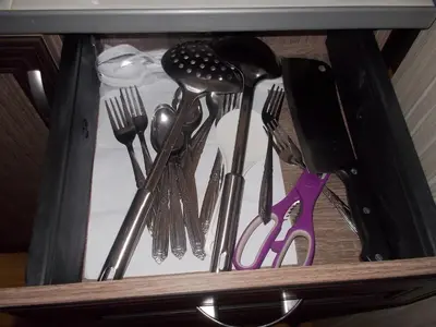 a drawer filled with forks and spoons and utensils at Estien’s cozy condo to stay with kitchen in Manila