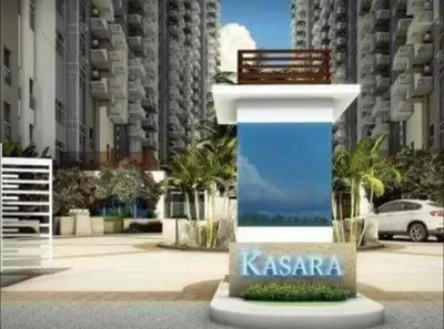 a bench sitting on top of a monument in front of a building at Studio Condominium - Short and Long Term Staycation in Manila