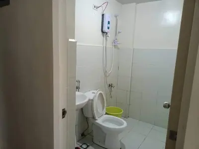 a bathroom with a toilet and a shower and a sink at Mhavic family room ,group friend good for 6 guest in Manila