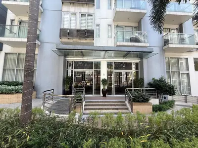 an apartment building with a staircase in front of it at Apartments across NAIA Terminal 3 in Manila