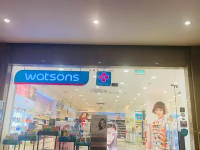 a watson store with a sign in the window at Morgan Suite BGC shortwalk4 Venice Canal Mall free pool gym in Manila