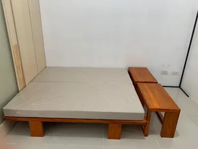 a bed in a room with a mattress on it at 1BR Jazz Bel-air Makati, POOLVIEW, TRIDENT in Manila