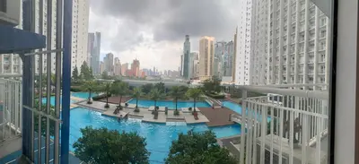 a view from a balcony of a city with buildings at 1BR Jazz Bel-air Makati, POOLVIEW, TRIDENT in Manila