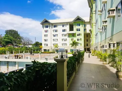 a walkway in front of a building at Centropolis King Bed Deluxe in Manila