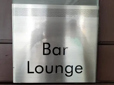 a sign with the words bar lounge on it at Andy's Place One Eastwood Tower 1 in Manila