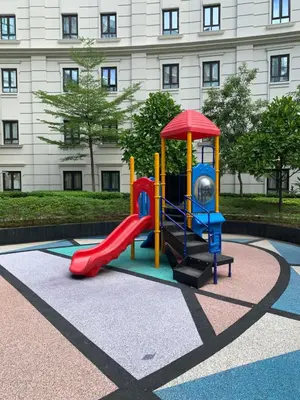 a playground with a slide in front of a building at 81 Newport Boulevard Cluster 4 - 8F across NAIA Airport, Terminal 3 in Manila