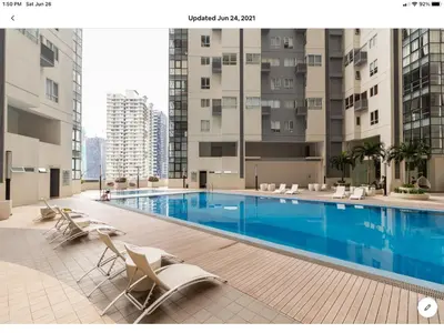 a swimming pool in the middle of a building at The Rustic Haven-1 in Manila