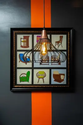 a picture of a lamp hanging on a wall at UNWND Flats in Manila