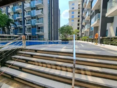 a group of stairs in a city with buildings at NAIA Terminal 3 Condotel by Ann in Manila