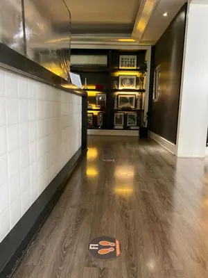 an empty room with a floor with a sign on it at Azumi Boutique Hotel in Manila