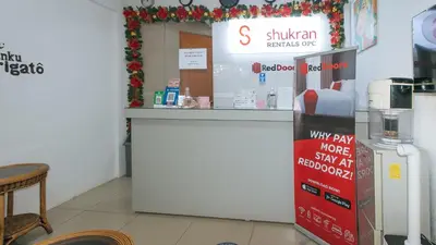 a store with a cash counter in a store at RedDoorz Plus near Tambo Paranaque in Manila