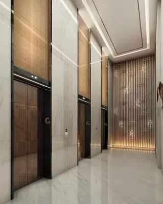 a hallway with elevators in a building at Somerset Central Salcedo Makati in Manila