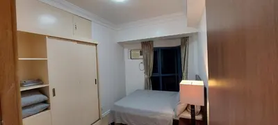 a small bedroom with a bed and a window at Magnificent View of Manila Bay, Roxas Blvd, US Embassy in Manila
