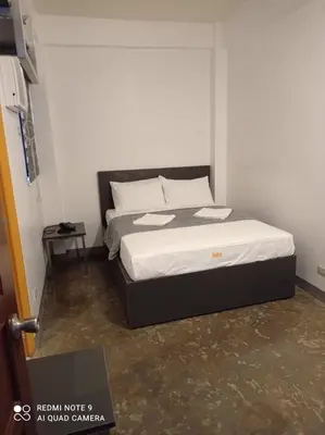 a bedroom with a bed in a room at 8 Zhensen Inn in Bacoor
