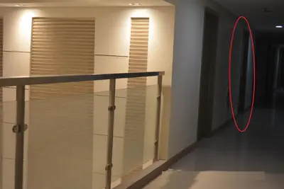 a room with a window with a red ring at Paranaque SM-Sucat Field Res. Bldg 5, 2/F, 2BR with Balcony in Manila