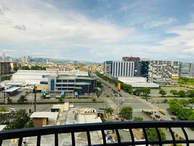 a view of a city with buildings and a street at FRD Condo Unit Tower A SoleMare Parksuites in Manila