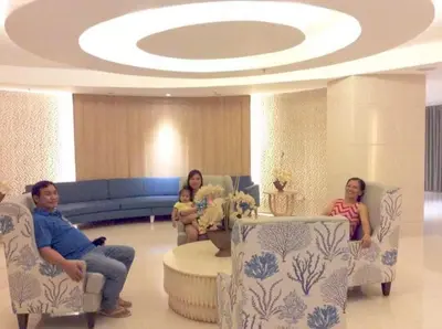 a group of people sitting in a waiting room at SHELL RESIDENCE c3 shortwalk mall of asia near airport in Manila