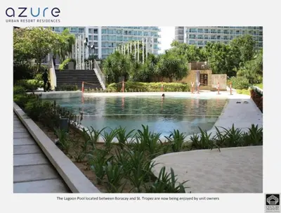 a large pool of water in a city with buildings at AZURE URBAN RESORT - PARANAQUE MANILA NEAR TERMINAL UNLIMITED WIFI and Netflix in Manila