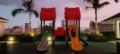 a playground with four chairs at SMDC Coast Residences near PICC World Trade Center MOA in Manila