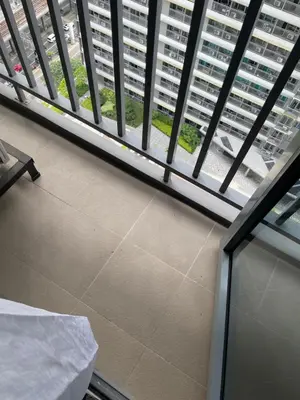 a view of a balcony of a building with windows at Condominium Fame Residence in Manila