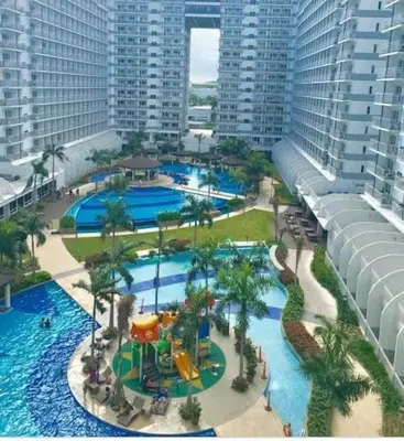 an aerial view of a resort with a water park at SHELL RESIDENCE c2 shortwalk Mall of Asia near Airport in Manila