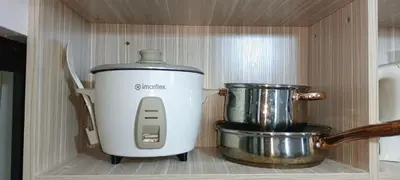 a kitchen appliance sitting on a shelf in a kitchen at 2-Bedroom Condo in Imus Cavite with UNLI WIFI, 50