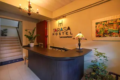 a lobby with a reception desk in a hotel at TARASA HOSTEL in Manila
